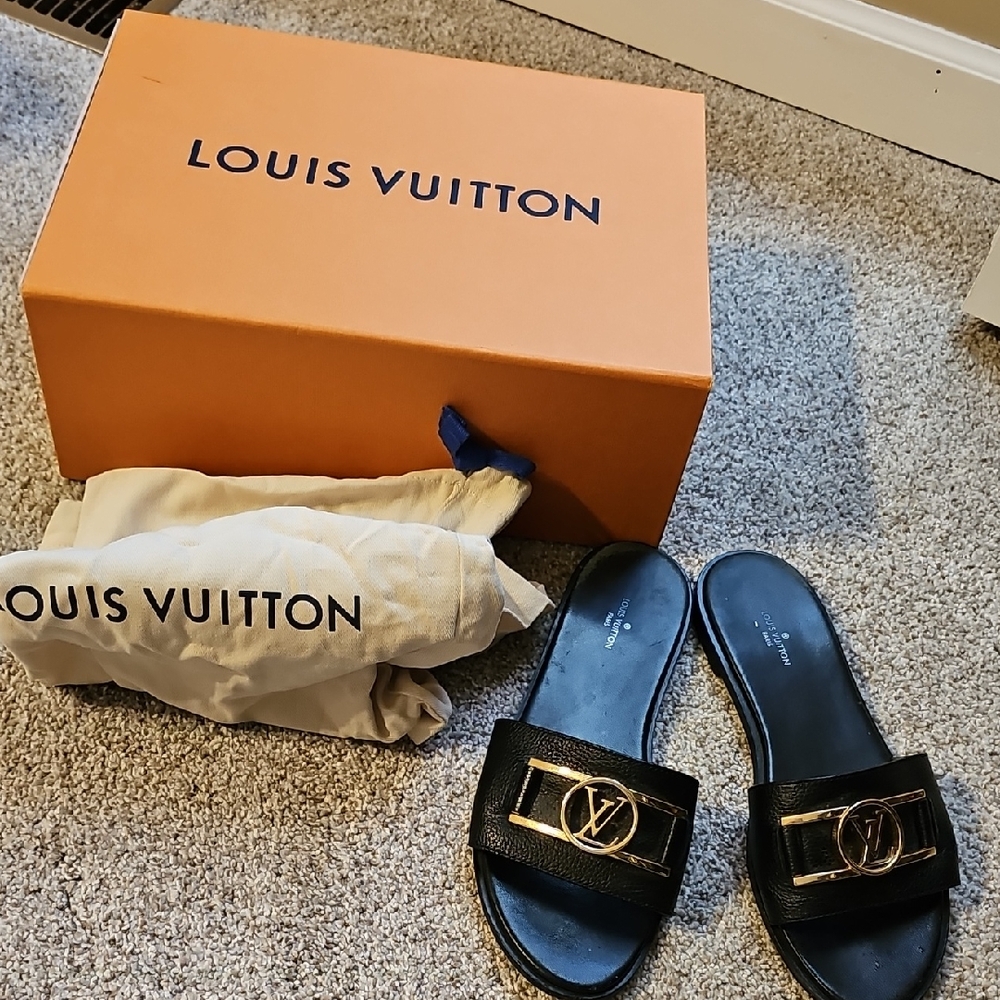 Louis Vuitton Black Slides with Gold Accents